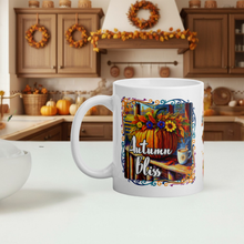 Load image into Gallery viewer, White mug with 'Autumn Bliss' design in a kitchen setting