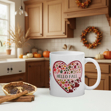 Load image into Gallery viewer, White mug with 'Hello Fall' design in a kitchen setting