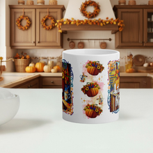 Load image into Gallery viewer, Decorative mug with autumn-themed design on a kitchen counter