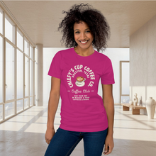 Load image into Gallery viewer, woman modeling unisex hot pink t-shirt with image phrase chiefys cup coffee club, with phrase may your day be blessed and your coffee be strong, with image graphic of a cup with coffee , heart shaped froth in cup