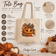 Load image into Gallery viewer, A beige tote bag with a Halloween pumpkin graphic, shown on a styled background with dimension callouts for strap length, height, and width. The image includes product details callouts, fabric close-ups, and text describing the bag as made from 100% certified organic cotton by Chicky's Cup.