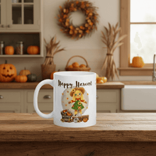 Load image into Gallery viewer, White mug with 'Happy Harvest' design featuring a scarecrow on a wooden table in a kitchen.