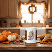 Load image into Gallery viewer, White mug with 'Hello Sunshine' design on a kitchen counter with pumpkins and autumn decorations.