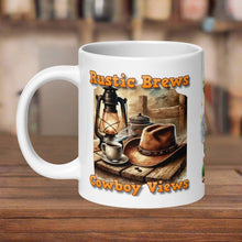 Load image into Gallery viewer, Right side view 20 oz white glossy mug  with image design of a rustic cowboy hat resting on a cactus, surrounded by small flowering cactus, rocks, desert animals, a cow skull, a wagon wheel, with sparkles and mist in the background.