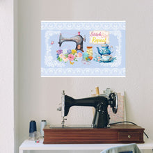 Load image into Gallery viewer, Front view 24″×36″ wall art  with image image phrase stitch sip repeat, with image design vintage sewing machine, with floral bouquet, with sewing accessories, with vintage kettle with cup and saucer, with lace border, with light blue background