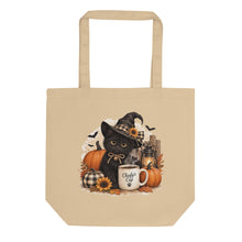 Load image into Gallery viewer, A beige canvas tote bag with a printed graphic of a black cat wearing a witch hat surrounded by pumpkins, sunflowers, and a mug that reads 'Chiefy's Cup'.
