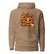 Load image into Gallery viewer, A latte pullover hoodie with a front kangaroo pocket and a graphic print of a jack-o'-lantern decorated with leopard-print bows, sunflowers, and small pumpkins.