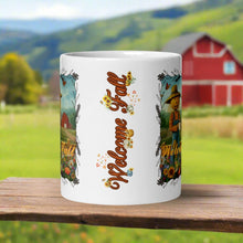 Load image into Gallery viewer, Back side view of a white glossy mug with the phrase "Welcome Fall" in festive font, showcasing small pumpkins, blowing leaves, and bright sunflowers.