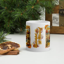 Load image into Gallery viewer, Back side view of a white glossy mug with the phrase "Thankful and Blessed" in festive font, featuring a fall flower arrangement design with golden sparkles.