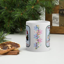 Load image into Gallery viewer, Back side view of a white glossy mug with colorful snowflakes and a string of Christmas lights.