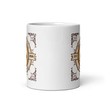 Load image into Gallery viewer, A white ceramic mug featuring a printed gold and brown design on a clean white background.