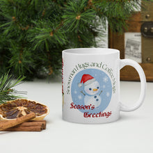 Load image into Gallery viewer, Right side view of white glossy mug with the phrase "Season's Greetings" in festive font, featuring a dancing snowman with snowflakes falling, set against a blue circle background.