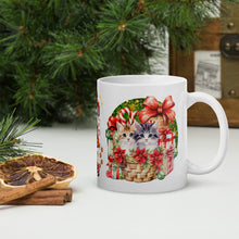 Load image into Gallery viewer, Right side view of a white glossy mug with an image design of adorable kittens nestled among Christmas presents, with a festive holiday background.
