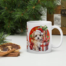 Load image into Gallery viewer, Right side view white glossy mug with a image of cute Christmas kittens and cute Christmas puppy surrounded by Christmas presents, with festive background
