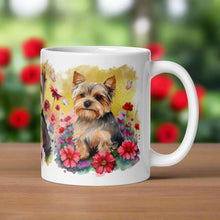 Load image into Gallery viewer, Right side view of a white glossy mug featuring a Yorkie puppy sitting among colorful flowers with a yellow background and butterflies completing the scene.