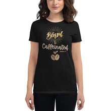 Load image into Gallery viewer, Woman modeling womens fitted black t-shirt with image phrase blessed and caffeinated, with image graphic of words in coffee oriented hues, coffee beans, brown small hearts