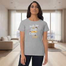 Load image into Gallery viewer, Woman wearing a t-shirt with text in a modern living room