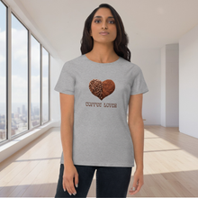 Load image into Gallery viewer, Woman modeling womens fitted grey t-shirt with image phrase coffee lover in brown font, with image graphic of a heart shape half filled with whole coffee beans, half filled with ground coffee
