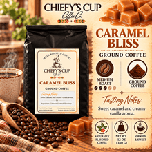 Load image into Gallery viewer, Chiefy's Cup Coffee Co. Caramel Bliss Ground Coffee in a black bag, displayed alongside caramel cubes, coffee beans, a wooden scoop, and flavor information on a warm beige background.
