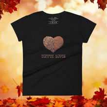 Load image into Gallery viewer, Black t-shirt with a heart design and &#39;Coffee Lover&#39; text on a background of autumn leaves.
