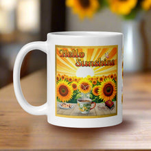 Load image into Gallery viewer, Left side view white glossy mug with image phrase &quot;Hello Sunshine,&quot; featuring sunflowers, a tabletop with a cup of coffee, books, and a plate of desserts, with a glowing sunrise in the background.
