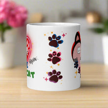 Load image into Gallery viewer, Back side view of a white glossy mug with a design of one pink, one blue, and one purple paw print surrounded by golden sparkles.
