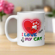 Load image into Gallery viewer, Left side view of a white glossy mug with a neon red heart design, featuring a cat nose and whiskers in the middle of the heart. The words “I love my cat” are displayed, with a tiny outline of a cat and the funny word “meow.”
