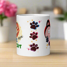 Load image into Gallery viewer, Back side view of a white glossy mug with a design of one pink, one blue, and one purple paw print surrounded by golden sparkles.
