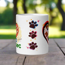 Load image into Gallery viewer, Back side view of a white glossy mug with one pink, one blue, and one purple paw print, surrounded by golden sparkles.

