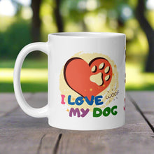 Load image into Gallery viewer, Left side view of a white glossy mug with a red heart design, featuring a paw print in the middle of the heart. The words “I love my dog” are displayed, with the funny word “woof.”
