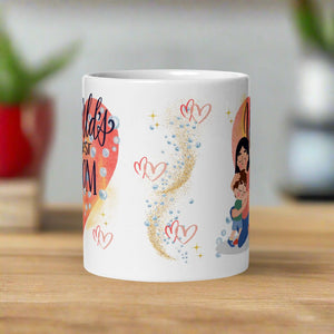 Back side view white glossy mug featuring watercolor hearts in the background with golden sparkles and soft bubbles.