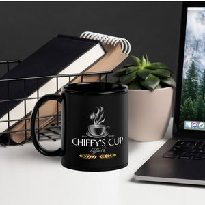 Right side view of black glossy mug featuring the Chiefy’s Cup logo with a white cup and saucer, white steam rising from the cup, and the phrase "Chiefy’s Cup."