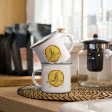 Load image into Gallery viewer, Two stacked white enamel mugs with silver rims, each decorated with a yellow cloud shape and a brown rabbit illustration, set on a woven placemat in a kitchen environment.
