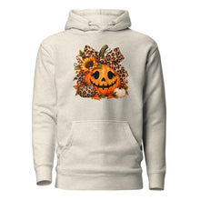 Load image into Gallery viewer, An Oatmeal Heather pullover hoodie featuring a large graphic print on the chest of a carved jack-o'-lantern pumpkin decorated with leopard-print bow and sunflower elements.
