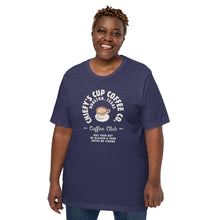 Load image into Gallery viewer, woman modeling unisex heather midnight navy t-shirt with image phrase chiefys cup coffee club, with phrase may your day be blessed and your coffee be strong, with image graphic of a cup with coffee , heart shaped froth in cup
