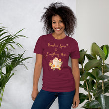 Load image into Gallery viewer, woman modeling wearing unisex maroon t-shirt with image phrase Pumpkin spice and everything nice, with image graphic of a cup with pumpkin spice coffee and cream, fall leaves, mini pumpkin
