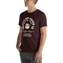 Load image into Gallery viewer, man modeling unisex oxblood black t-shirt with image phrase chiefys cup coffee club, with phrase may your day be blessed and your coffee be strong, with image graphic of a cup with coffee , heart shaped froth in cup
