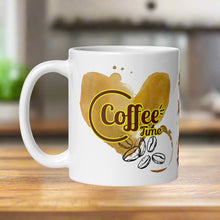 Load image into Gallery viewer, Left side view of white glossy mug with the image phrase &quot;Coffee Time,&quot; featuring a coffee stain heart and coffee stains, with coffee beans in the background.
