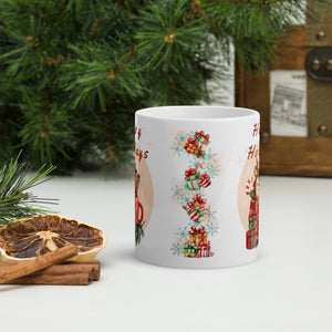 Back side view of a white glossy mug with festive colored presents, blue snowflakes, and pink mist in the background.