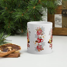 Load image into Gallery viewer, Back view of white glossy mug featuring a festive cup of hot chocolate with marshmallows and cookies, adorned with silver snowflakes and golden sparkles.
