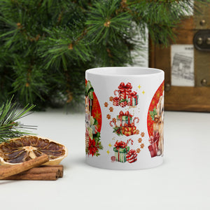 Back side view of a white glossy mug with an image design of Christmas presents, golden sparkles, and paw prints decorating the background.