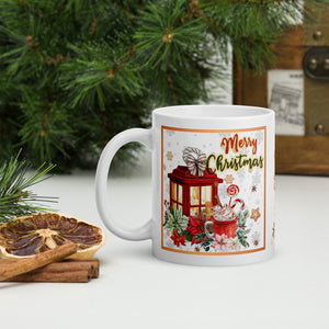 Left side view of white glossy mug with the phrase "Merry Christmas," featuring a red lantern and mug topped with whipped cream, candy cane, gingerbread cookie, poinsettias, and snowflakes in the background with a golden frame.