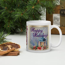 Load image into Gallery viewer, Right side view of a white glossy mug with the image phrase &quot;Happy Holidays&quot; in festive red font, showcasing a vintage lantern against a blue background.
