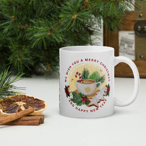 Right side view of white glossy mug with the phrase "We Wish You A Merry Christmas and a Happy New Year," featuring a festive mug surrounded by gingerbread cookies, holly, pine tree clippings, and a candy cane, with golden sparkles and a yellow circle background.