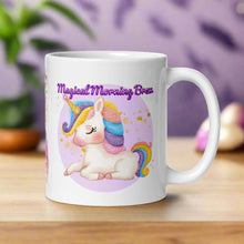 Load image into Gallery viewer, Right side view of a white glossy mug featuring the phrase &quot;Magical Morning Brew&quot; and a colorful-maned white unicorn with a golden horn, surrounded by golden sparkles and set against a purple circular background.
