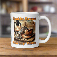 Load image into Gallery viewer, Right side view 11 oz white glossy mug with image phrase &quot;Rustic Brews Cowboy Views,&quot; featuring a rustic cowboy hat resting on a weathered table, with a steaming cup of coffee and an old lantern beside it.
