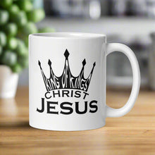 Load image into Gallery viewer, Right side view of a white glossy mug featuring the phrase &quot;King of Kings, Christ Jesus.&quot;
