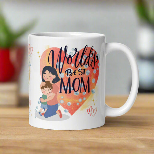 Right side view white glossy mug featuring a heartwarming illustration of a mother hugging a small boy, with a large watercolor heart in the background. Golden sparkles and soft bubbles surround the scene, with the words 