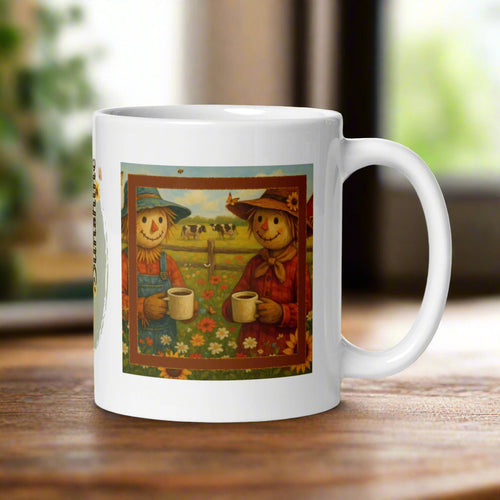 Right side view of a white glossy mug featuring a happy male and female scarecrow couple in a flower-filled field, each holding a cup of coffee.