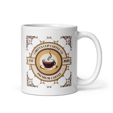 Load image into Gallery viewer, A white ceramic coffee mug featuring a circular vintage-style coffee label graphic with the text 'Chiefy's Cup Coffee Co' and 'Premium Coffee' in brown and gold tones.
